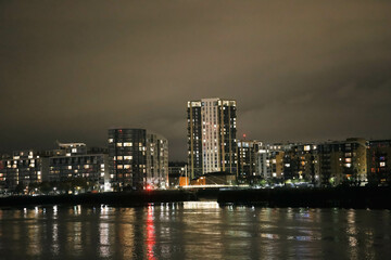Fototapeta na wymiar The Thames River and its Majestic High-Rise Skyline