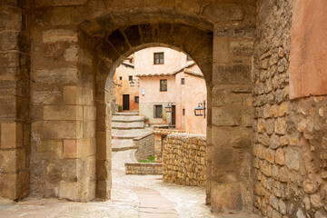 Stone arch in the streets of the beautiful medieval village of Albarracín in Teruel (Spain).