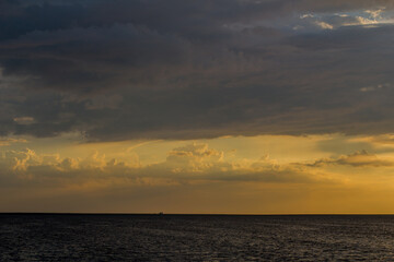 Fototapeta na wymiar Beautiful sunset on the seashore, sunset background