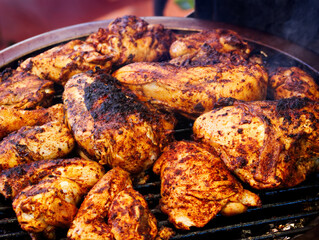 Cooking Pieces Of Chicken On Barbecue Grill
