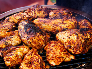 Cooking Pieces Of Chicken On Barbecue Grill