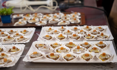 Degustation appetisers for visitors made by great chefs of high cuisine French restaurants, winter festival, Avenue de Champagne, Epernay, France