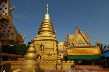 Fototapeta premium Wat Phra That Chom Sak temple it is believed that if you pay homage, you will receive maximum prosperity and magically experience only good things in your life. Located at Chiang Rai in Thailand.