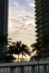 Fototapeta na wymiar Miami Beach at sunset, beaches, sand, water and buildings