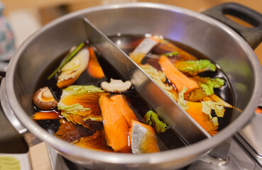salmon and vegetable in stainless shabu pot,  sukiyaki and asian food culture
