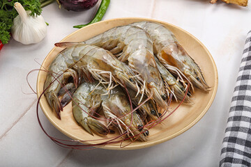 Raw fresh tiger prawn on the plate