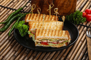 Club sandwich with chicken cheese and salad