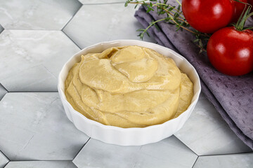 Dijon mustard sauce in the bowl