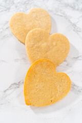 Heart-shaped sugar cookies with royal icing