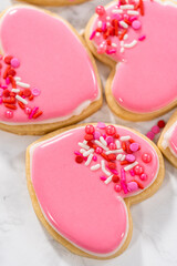 Heart-shaped sugar cookies with royal icing