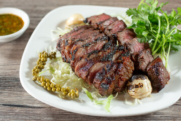 A view of a plate of Lao style beef.