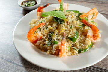 A view of an entree of shrimp fried rice.