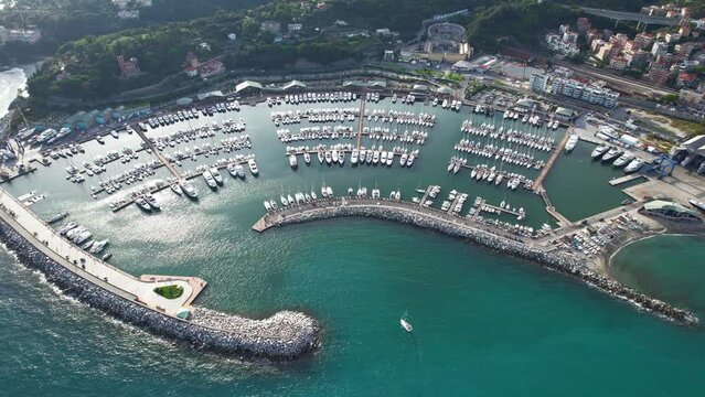 Aerial view above the Marina and Yachts and boats of the  mediterranean Italian village of Varazze in north Italy