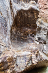 Bizarre  mountain bends along Mujib River Canyon hiking trail in Wadi Al Mujib in Jordan