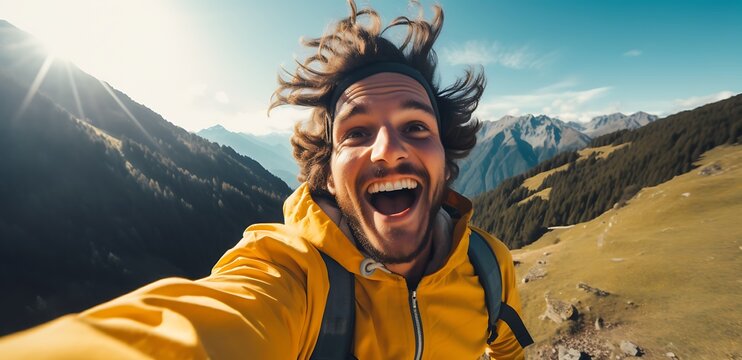 Joyful Man taking a selfie in the mountain. landscape view
