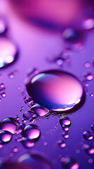 macro close-up large transparent droplets of liquid water dew with light glare beautiful round shape and shadow on saturated violet purple background