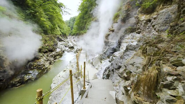 Cinematic gimbal shot of steam vents at Oyasukyo Gorge in Akita prefecture in Japan