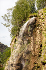 Waterfall on a rocky river in the mountains