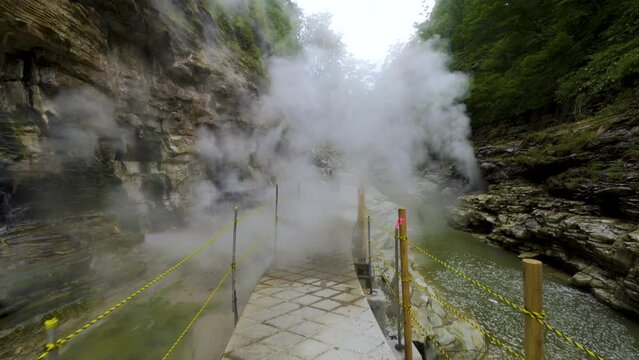 Cinematic gimbal shot of steam vents at Oyasukyo Gorge in Akita prefecture in Japan