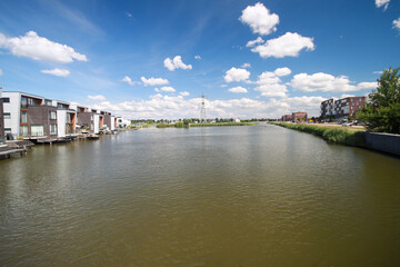 Fototapeta premium Watering canal in the Waterwijk area of the Rotterdam Nesselande district