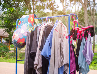 Clothes rack with clothes hunger outdoors to catch
