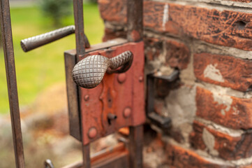 old lock at the entrance gate ,old brick wall , Nowy Sącz