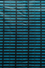 Overhead view of blue geometric ankara fabric, flatlay of blue geometric ankara material on a table