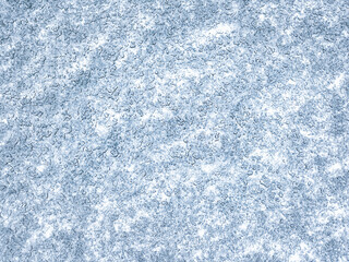 Winter abstract background. Snowflake pattern on a blue background. Macro texture. Natural background. View from above. 