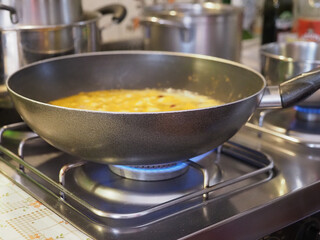 cooking vegetables in frying pan