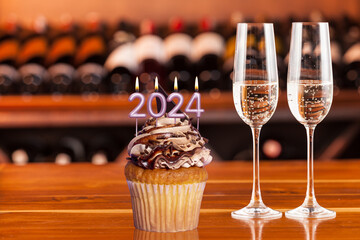 Cupcake With Candles Forming Number 2024 for Happy New Year - New Year Celebration.