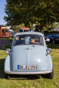 Weiterstadt, Germany September 24, 2023: Isetta 250 in blue from BMW with chrome flashing in Weiterstadt at Braunshardt Castle