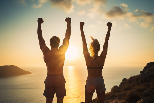 Joyful Triumph: Couple in a Stock Photo Celebrating Victory with Raised Arms