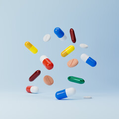Falling medicine pills and antibiotics isolated over blue background. Healthcare and medical concept. 3D rendering.