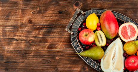 Assortment of fruits on a tray.