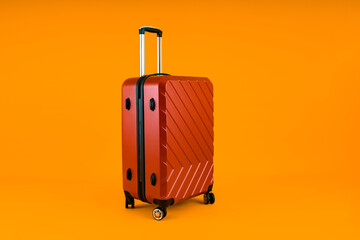 Red Suitcase on Vibrant Yellow
