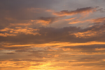 Naklejka na ściany i meble Beautiful sky at sunset, background with sunset