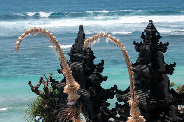 Gates of Melasti Beach on sunny day. Bukit, Bali, Indonesia.