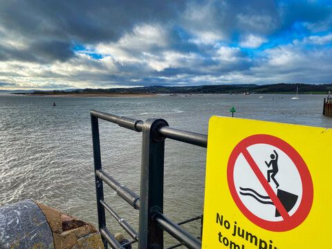 No jumping sign at Devon beach in the UK
