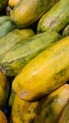 Heap of papaya fruit, stacked of papaya background.