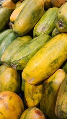 Heap of papaya fruit, stacked of papaya background.