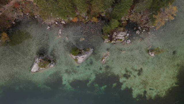 Crystal clear water at the Berchtesgaden Hintersee lake with a stunning view from Top