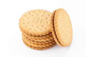 Sandwich cookies lie one on top of the other, isolated on a white background.