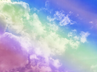 beauty abstract sweet pastel soft violet and yellow with fluffy clouds on sky. multi color rainbow image. fantasy growing light