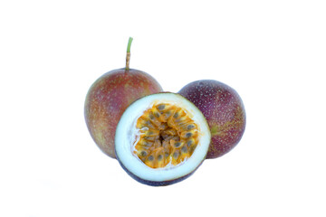 isolated passion fruit on white background. The passion fruit has an oval shape, a thick, oily rind. There are many seeds inside the fruit. It is a healthy fruit with high fiber content.   