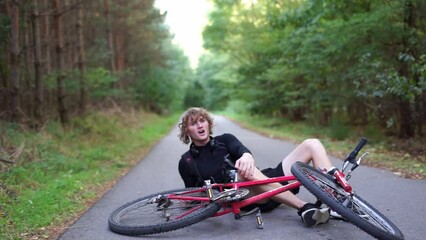 a man fell off his bicycle