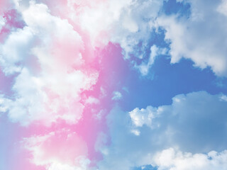 beauty abstract sweet pastel soft pink and blue with fluffy clouds on sky. multi color rainbow image. fantasy growing light