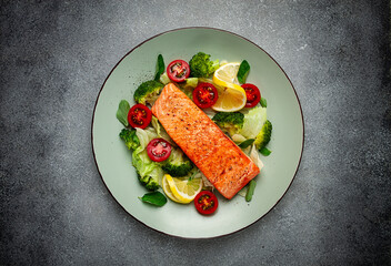 grilled salmon fillet, with vegetables, broccoli, cherry, iceberg lettuce, spices and herbs, homemade, no people,