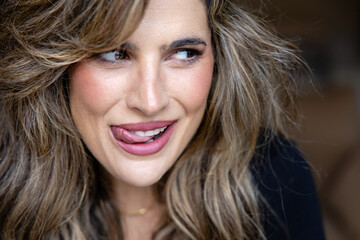 Close up closeup of beautiful woman smiling with sensual expression