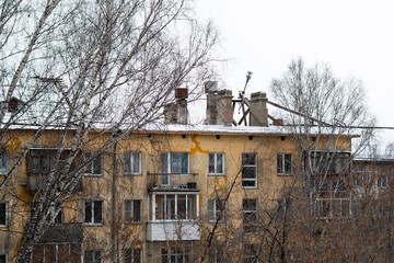 The roof collapsed under the weight of snow. Close-up of the roof Gables