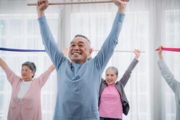 Senior lifestyle at home. Older adults exercise at their houses. Senior exercising at a convalescent facility. - obrazy, fototapety, plakaty